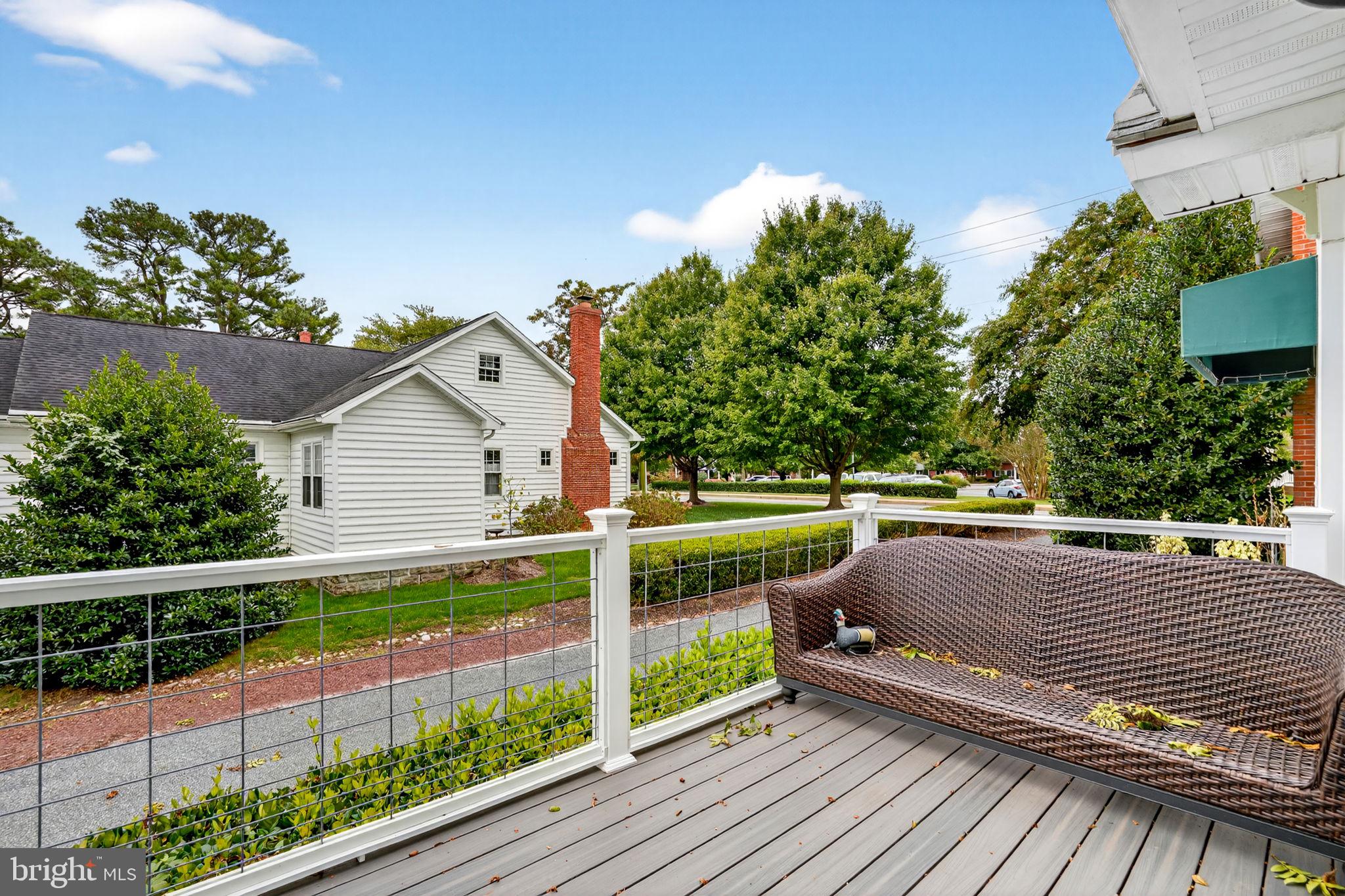 501 South Main Street Berlin, MD 21811 - Photo 68 of 75 a view of a deck with a yard