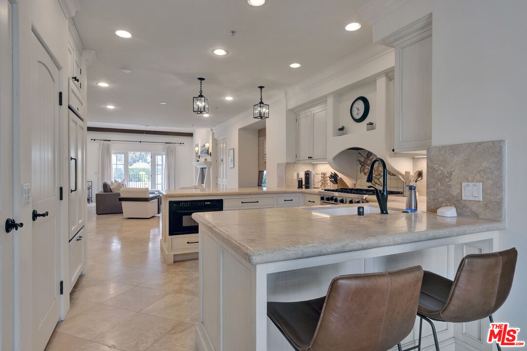 211 Bath Street Santa Barbara, CA 93101 - Photo 17 of 25 a view of kitchen island with stainless steel appliances kitchen island
