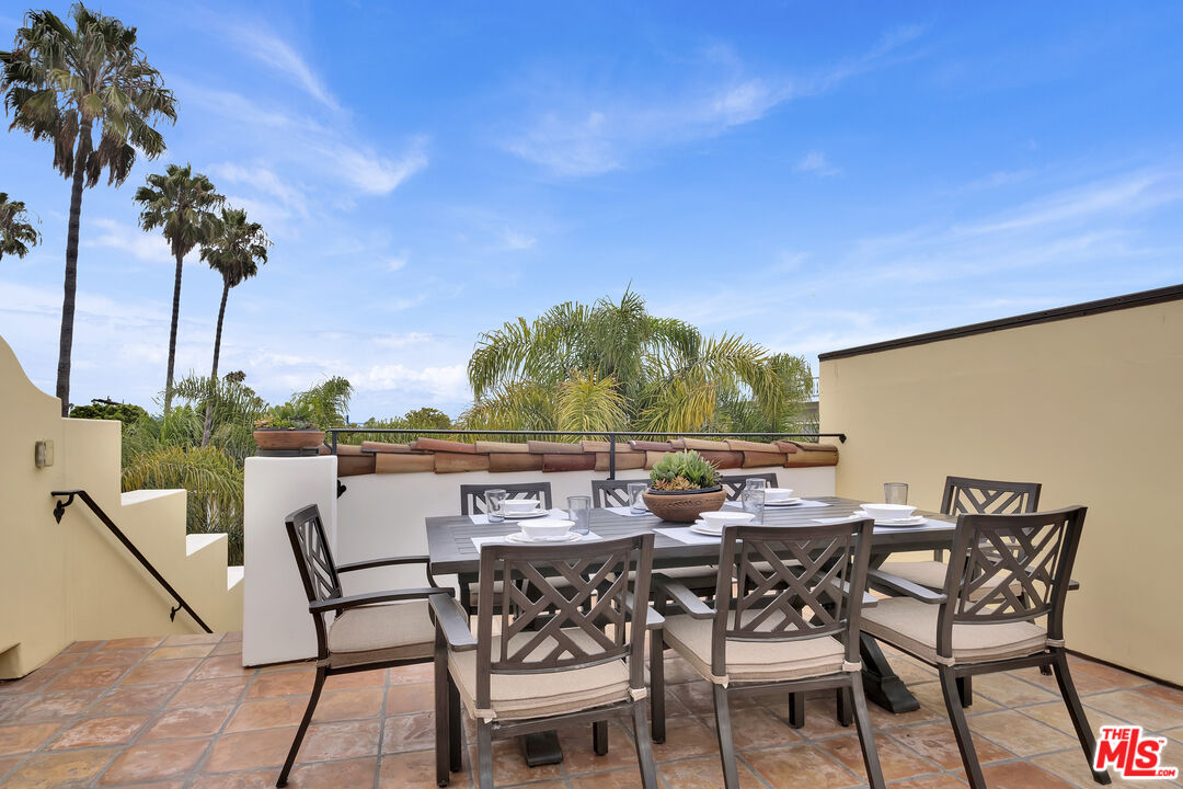 211 Bath Street Santa Barbara, CA 93101 - Photo 23 of 25 a view of an outdoor space with furniture and garden