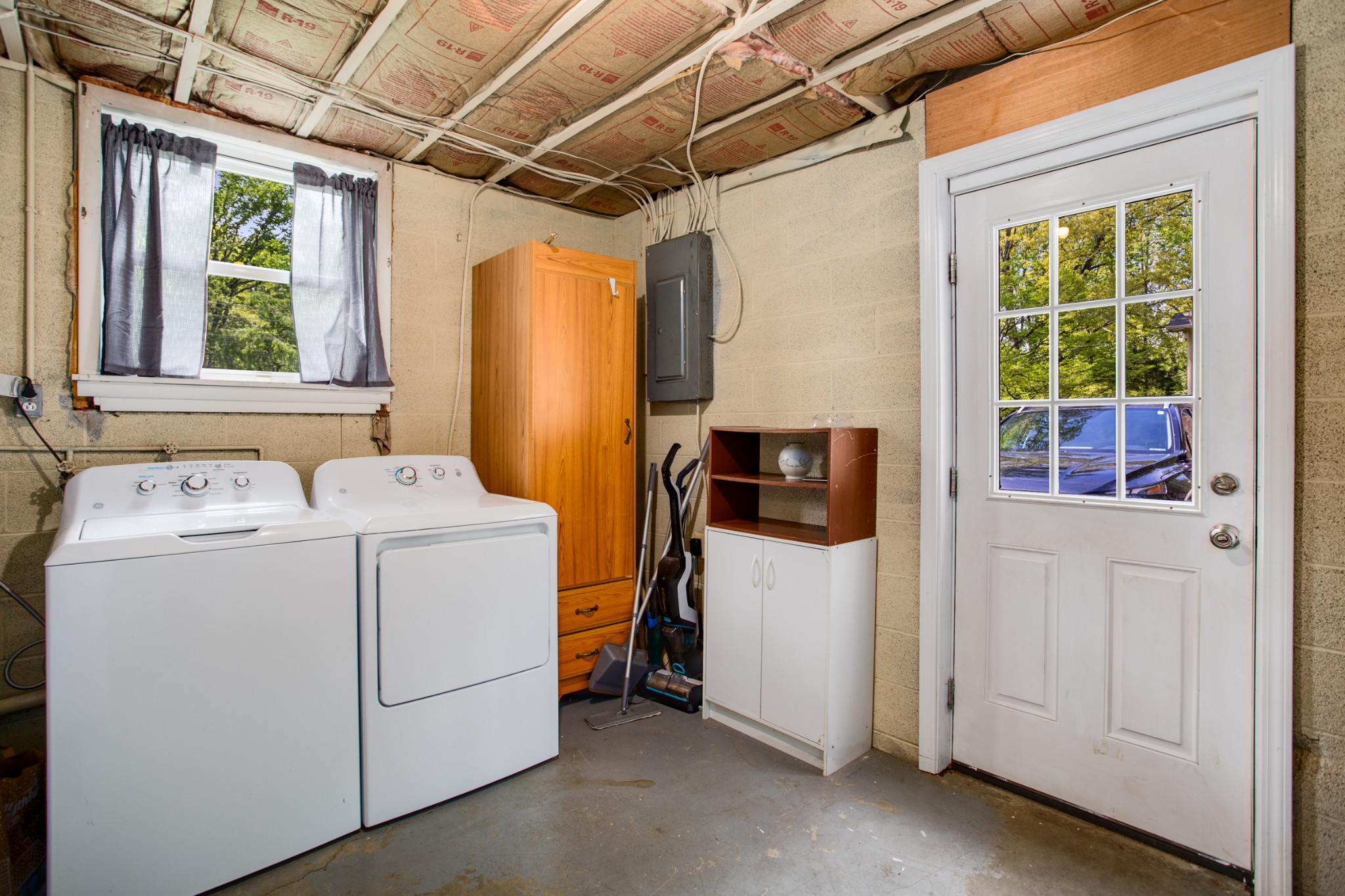 7711 Chester Road Fairview, TN 37062 - Photo 17 of 21 a utility room with dryer and washer