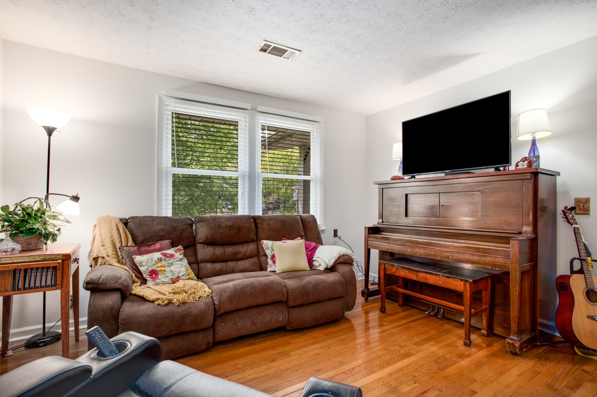 7711 Chester Road Fairview, TN 37062 - Photo 7 of 21 a living room with furniture and a flat screen tv