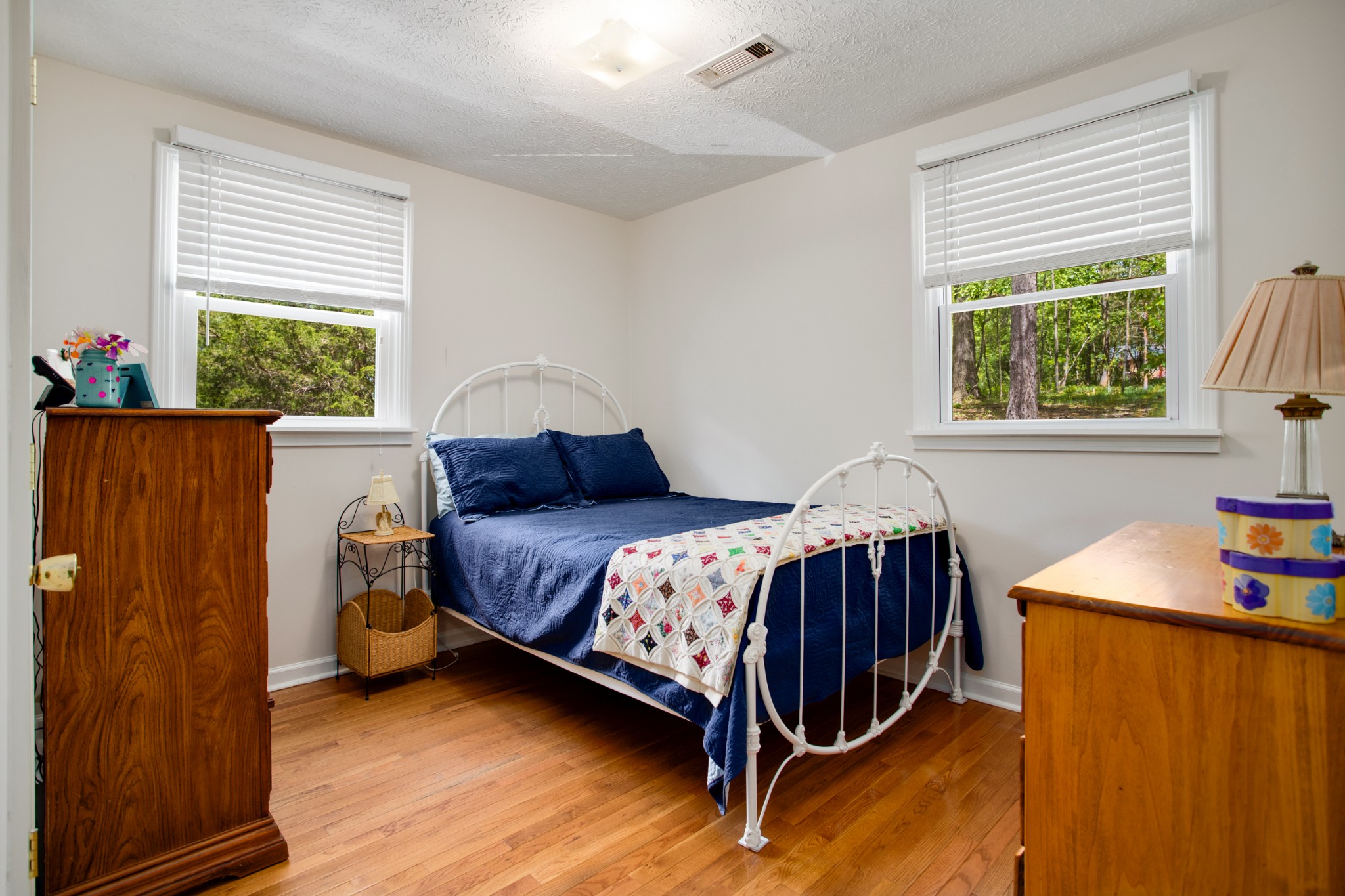 7711 Chester Road Fairview, TN 37062 - Photo 8 of 21 a bedroom with a bed and a window