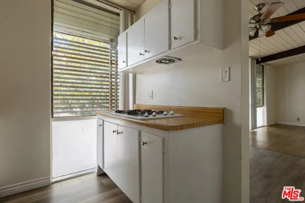 a view of a kitchen with a sink