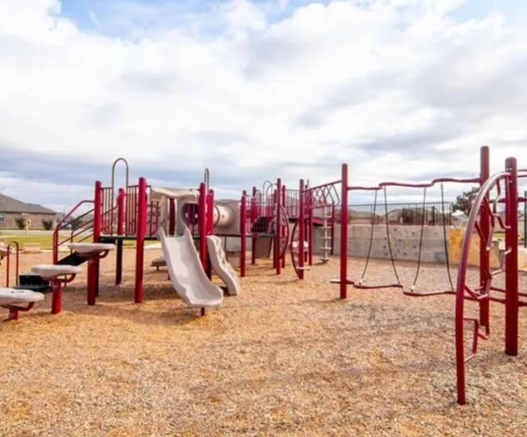 a view of a park with swings