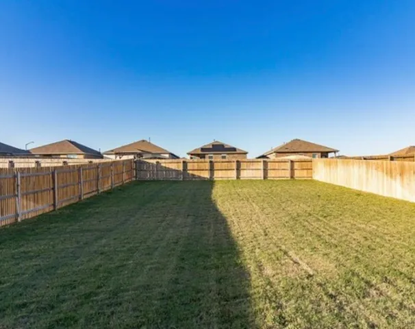 a view of an outdoor space and swimming pool