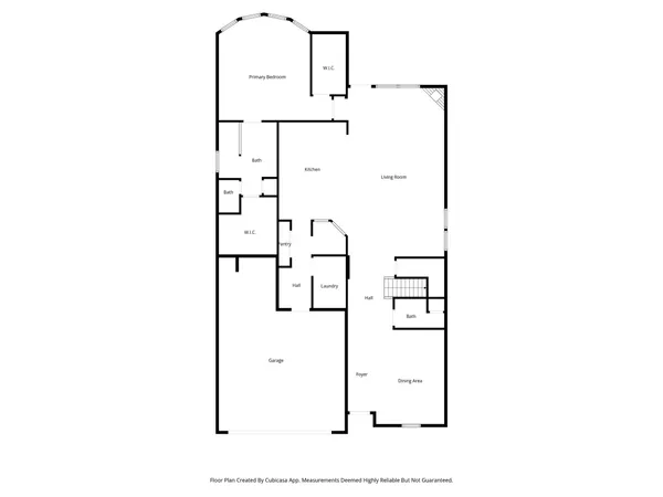 a view of a chair and table in the patio