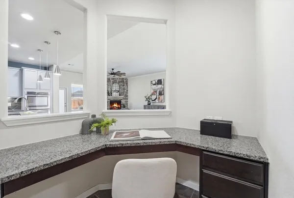 a bathroom with a tub shower and a sink