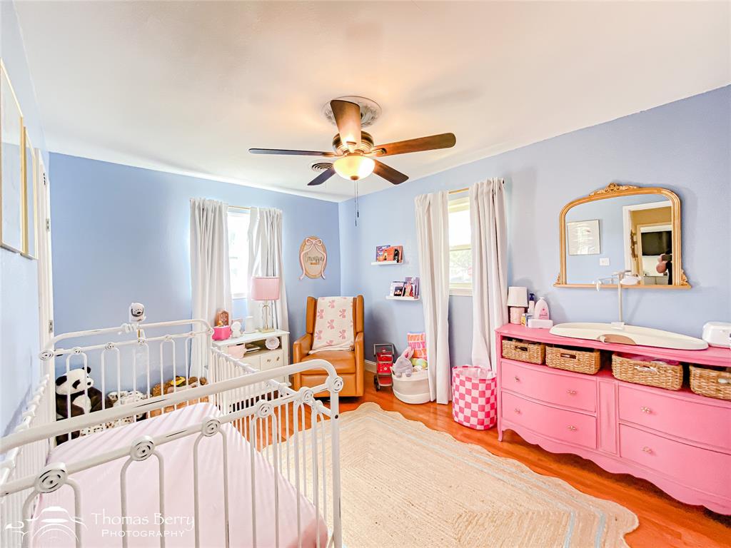 1502 Sunset Street Merkel, TX 79536 - Photo 20 of 35 a bedroom with furniture and a window