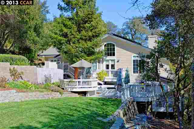 34 Oak Road Orinda, CA 94563 - Photo 1 of 1 a view of multiple house with a deck and furniture