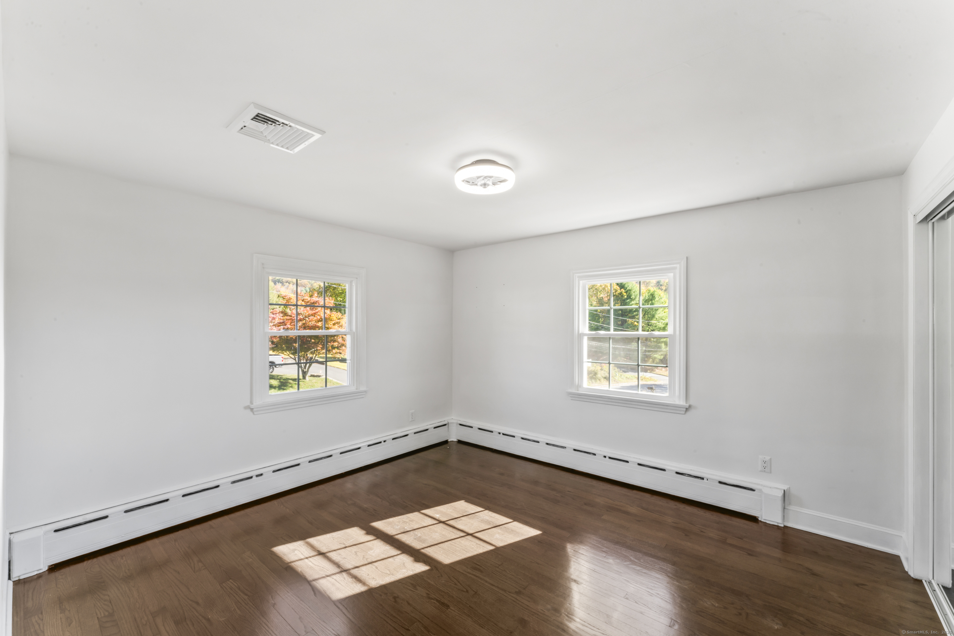 92 Feldspar Avenue Beacon Falls, CT 06403 - Photo 15 of 32 an empty room with windows