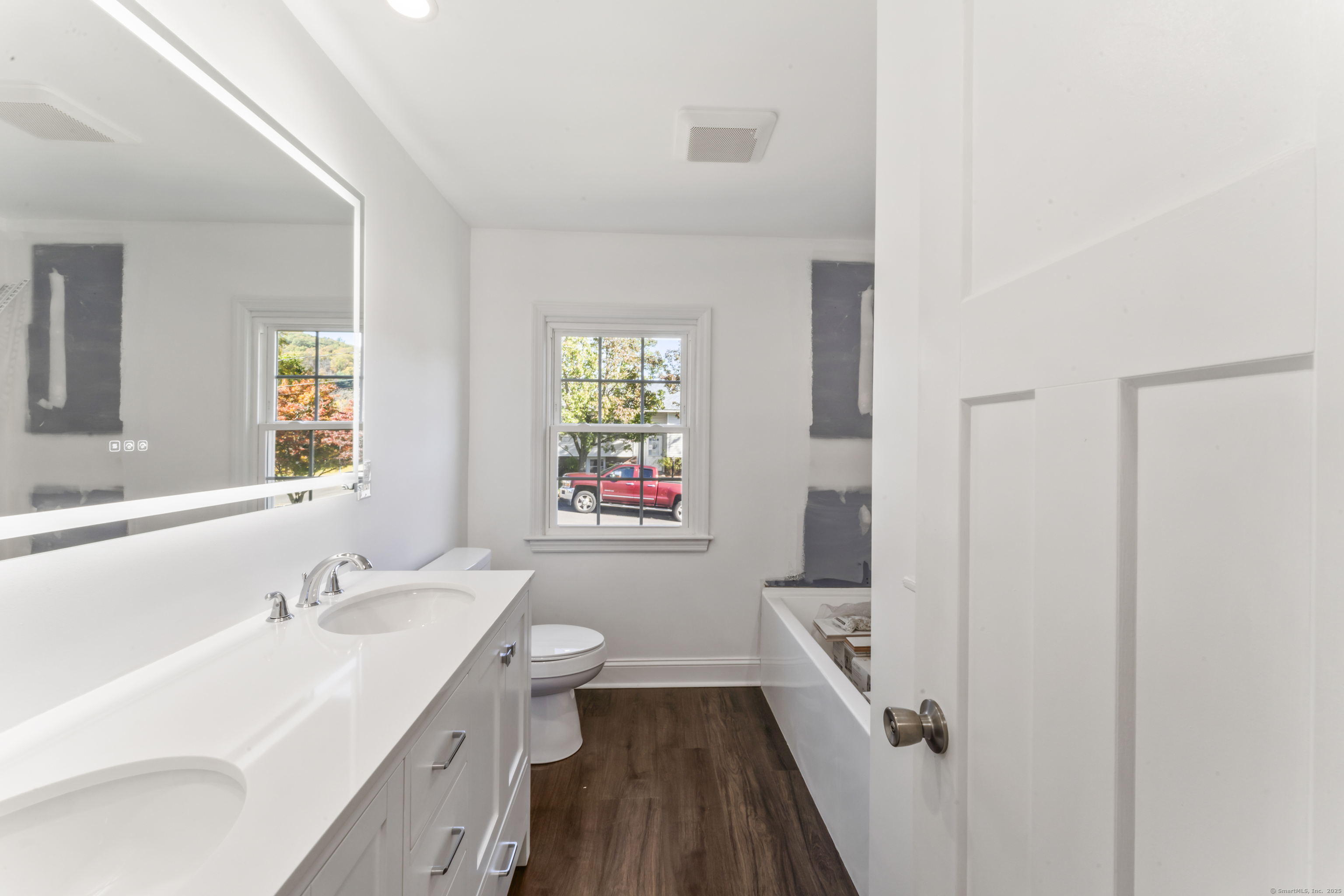 92 Feldspar Avenue Beacon Falls, CT 06403 - Photo 20 of 32 a bathroom with a sink a toilet and a bathtub