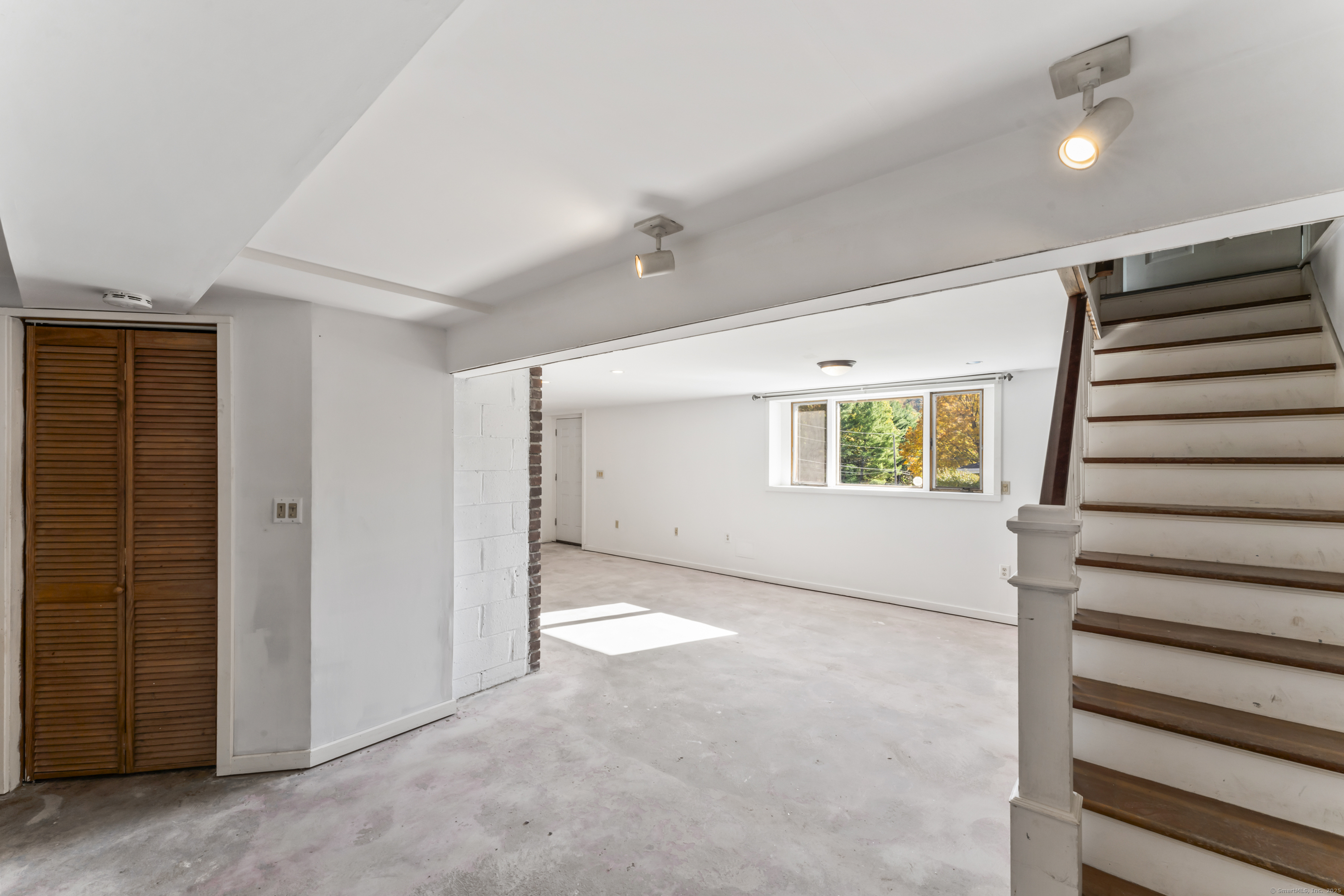 92 Feldspar Avenue Beacon Falls, CT 06403 - Photo 24 of 32 an empty room with windows