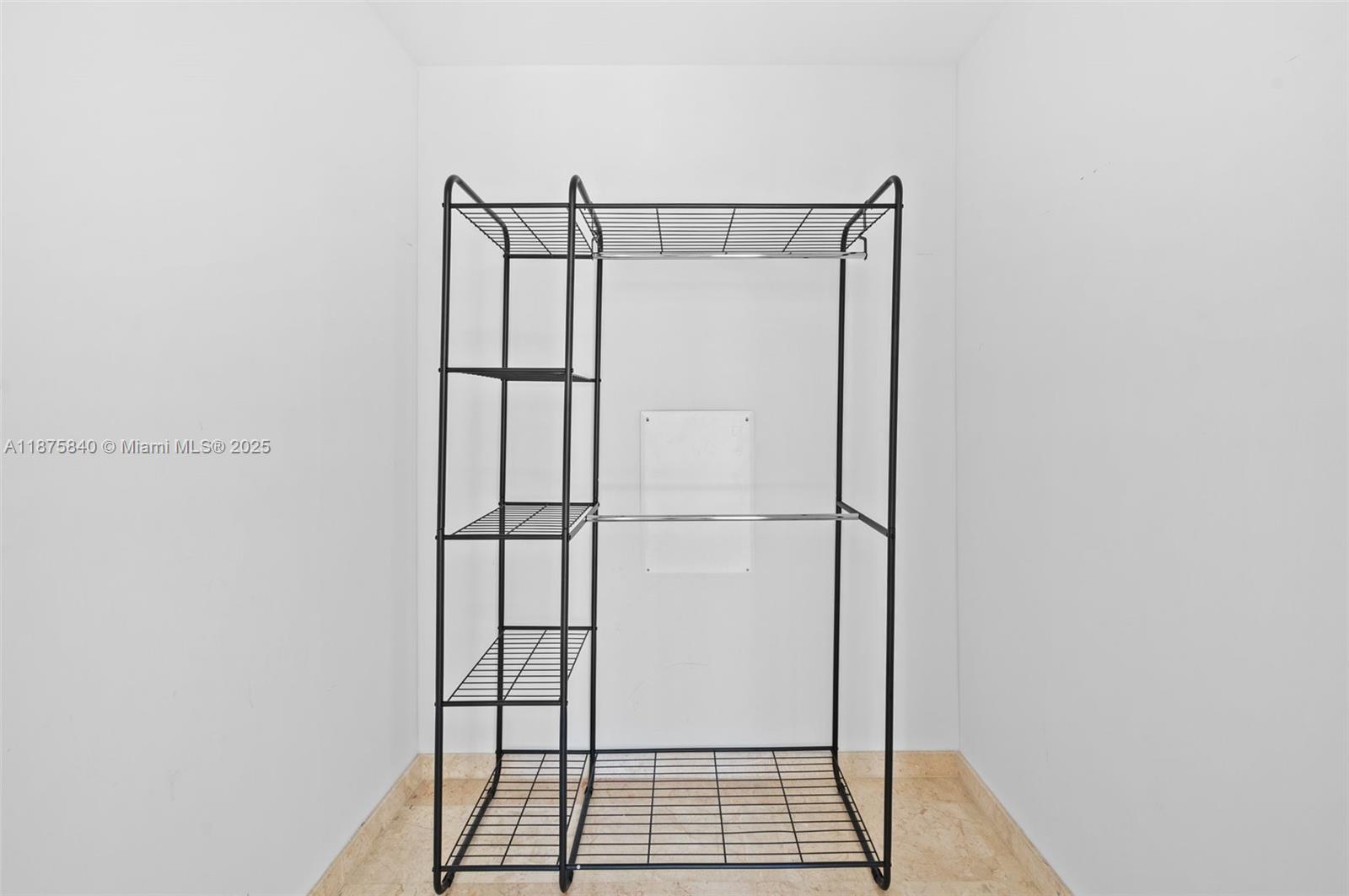 88 Southwest 7th Street, Unit 1403 Miami, FL 33130 - Photo 30 of 53 a bathroom with a glass shower door