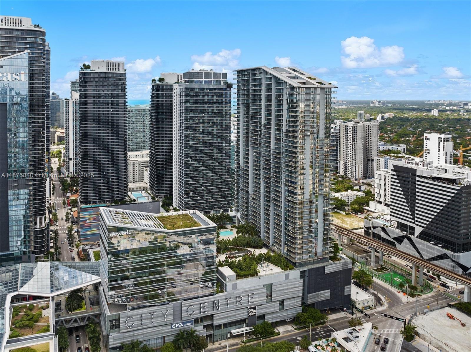 88 Southwest 7th Street, Unit 1403 Miami, FL 33130 - Photo 3 of 53 a view of city with tall buildings