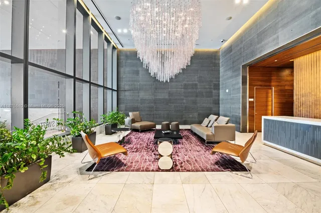 a view of an empty room with windows