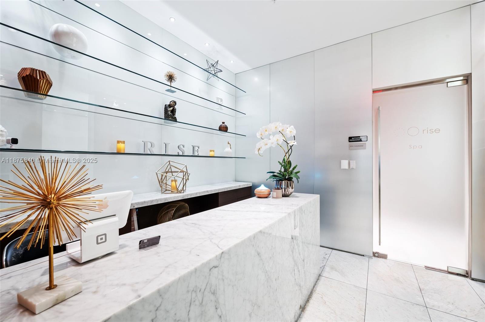 88 Southwest 7th Street, Unit 1403 Miami, FL 33130 - Photo 45 of 53 a living room with stainless steel appliances kitchen island granite countertop furniture and a refrigerator