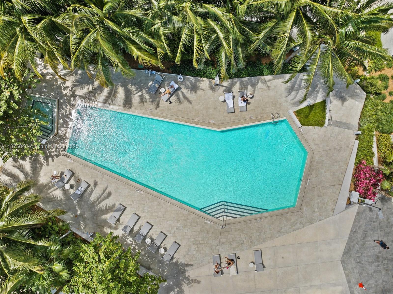 88 Southwest 7th Street, Unit 1403 Miami, FL 33130 - Photo 50 of 53 a view of a tree with front of a house