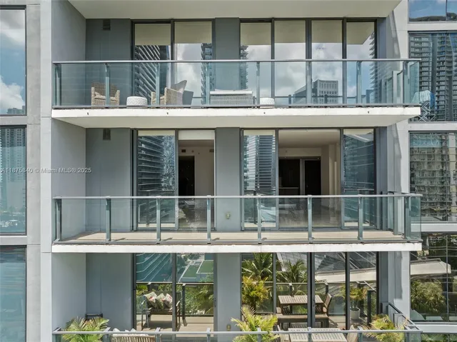 a view of balcony with wooden floor