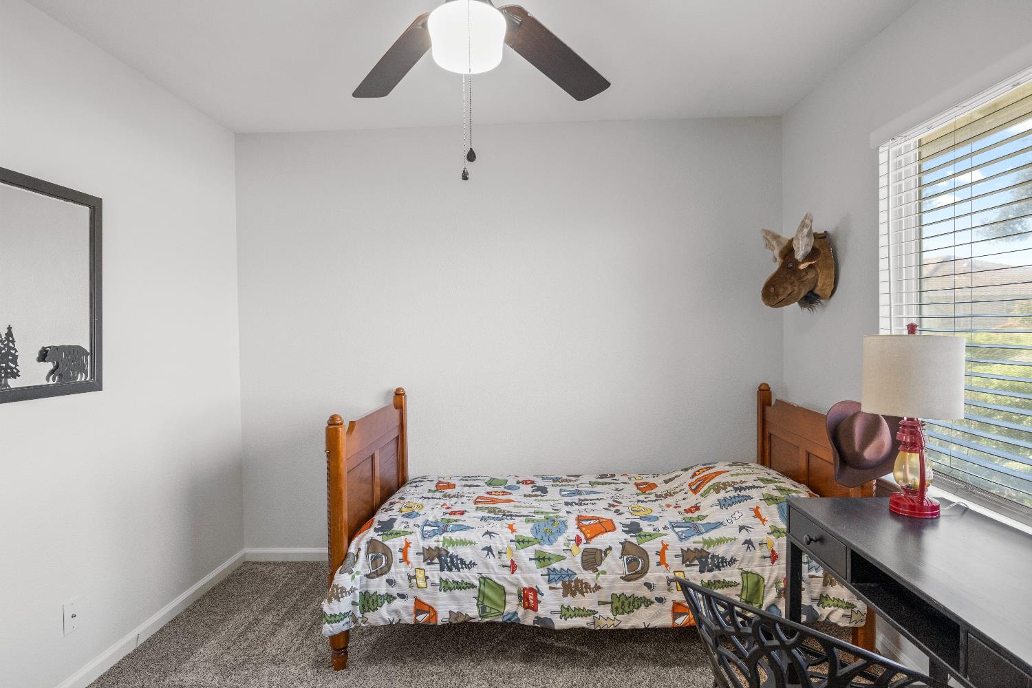 637 Rebekah Court Ripon, CA 95366 - Photo 41 of 69 a bedroom with a bed and a window