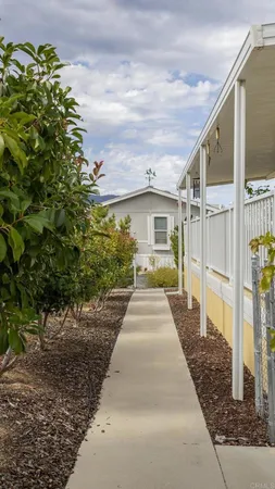 a view of a swimming pool with a lounge chair