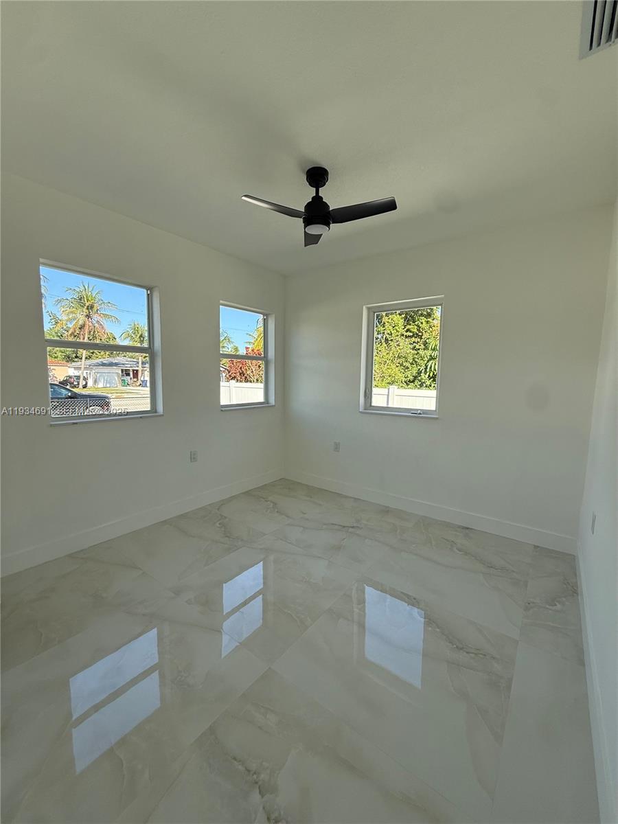 260 Northwest 119th Street Miami, FL 33168 - Photo 21 of 31 a view of an empty room with a window