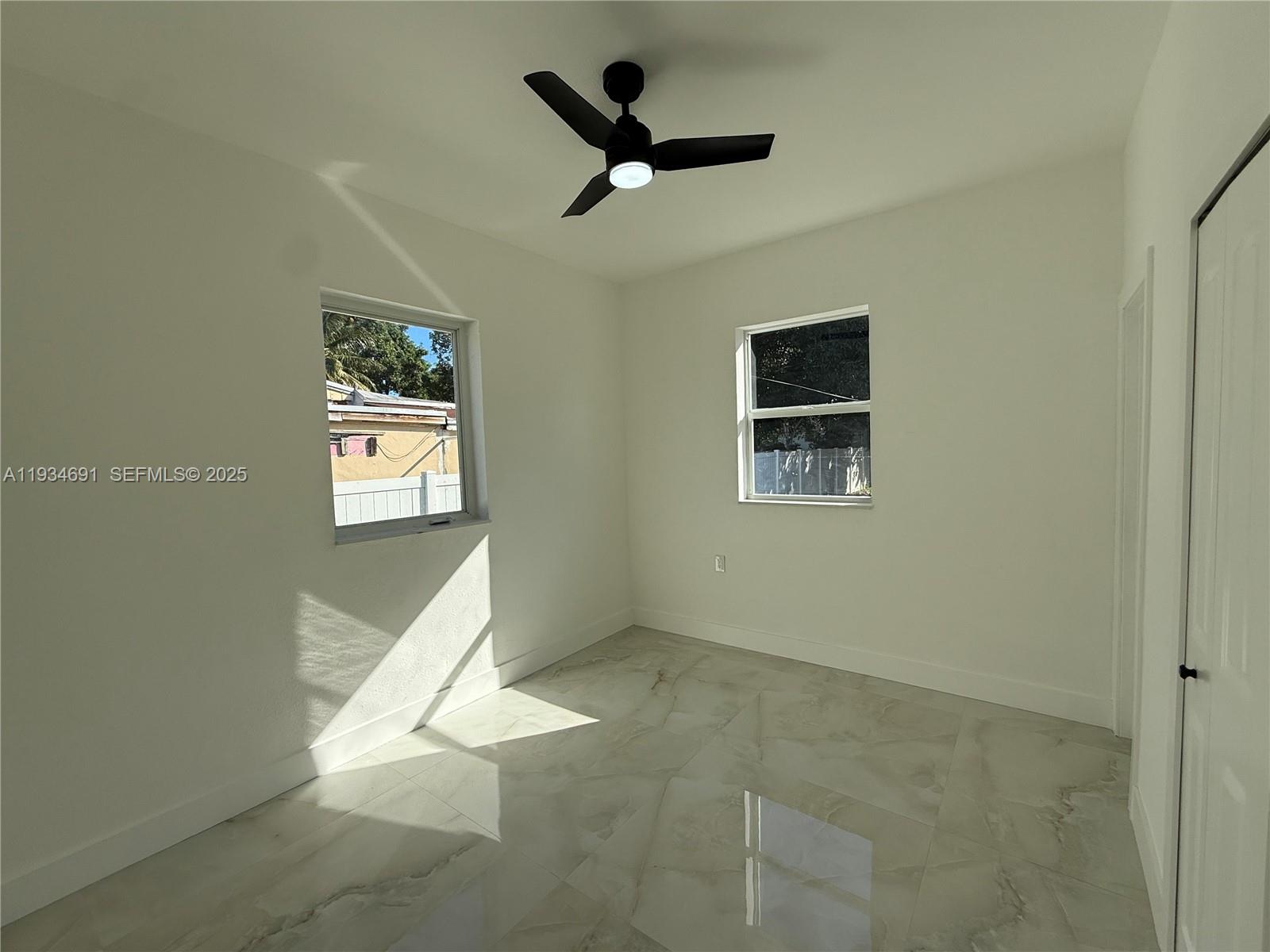260 Northwest 119th Street Miami, FL 33168 - Photo 25 of 31 a view of livingroom and hardwood floor