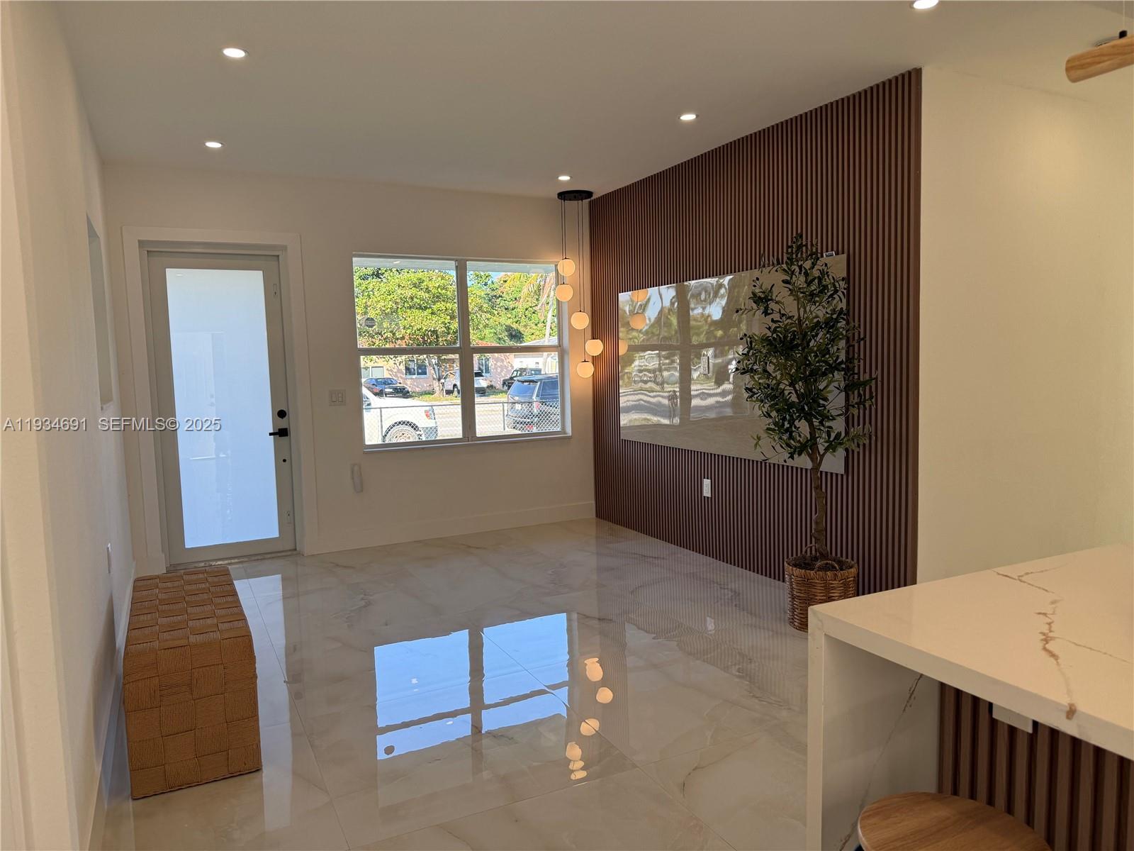 260 Northwest 119th Street Miami, FL 33168 - Photo 9 of 31 a living room with furniture and a flat screen tv