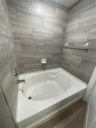 a bathroom with a bathtub