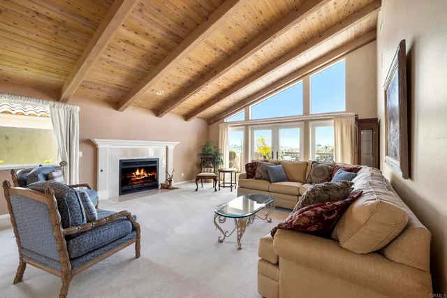 a kitchen with stainless steel appliances granite countertop wooden cabinets and a stove top oven