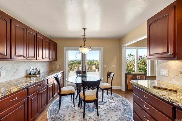 a view of room with window and wooden floor