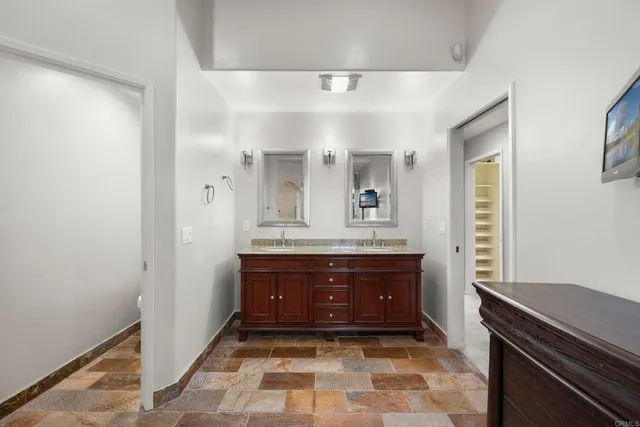 a view of a balcony with wooden floor