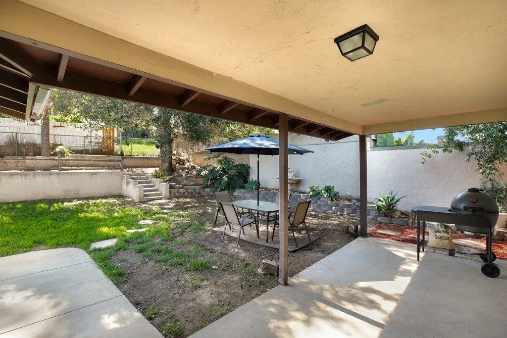 2809 Reed Road Escondido, CA 92027 - Photo 24 of 25 a patio with yard glass top table and chairs