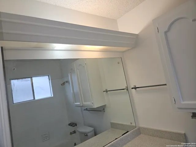 a backyard of a house with seating space