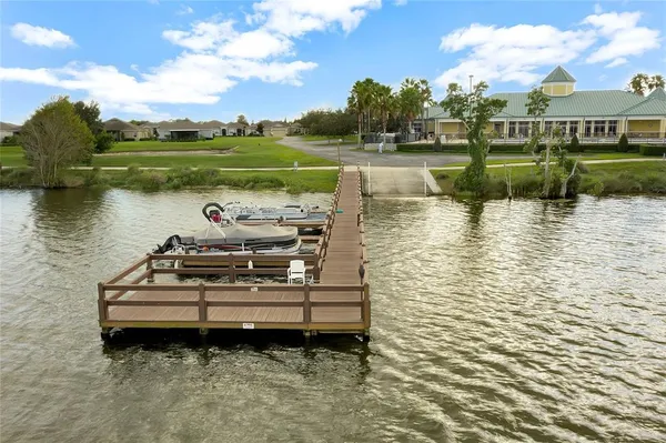 a swimming pool with a lake view