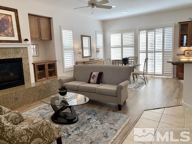 1850 Hunter Creek Road Reno, NV 89519 - Photo 7 of 38 a living room with furniture and a fireplace