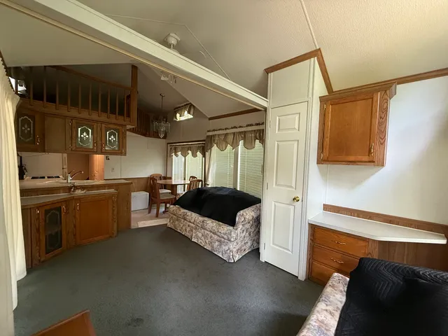 a bedroom with a bed and a walk in closet