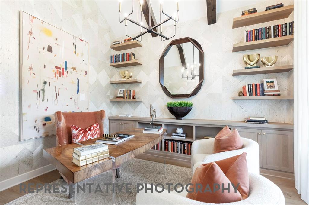 3808 Meander Way Prosper, TX 75078 - Photo 27 of 40 a living room with furniture and a wall painting