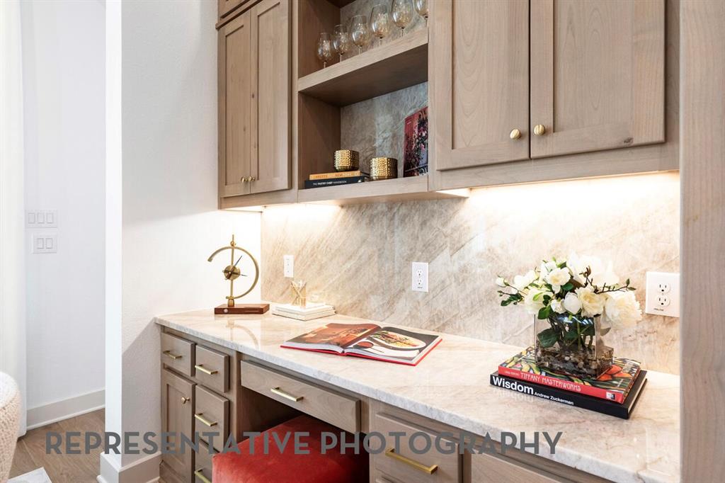 3808 Meander Way Prosper, TX 75078 - Photo 29 of 40 a kitchen with a sink cabinets and a stove top oven