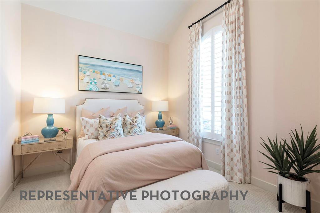 3808 Meander Way Prosper, TX 75078 - Photo 30 of 40 a bedroom with a bed and a potted plant