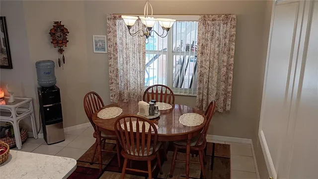 a en suite bathroom with a double vanity sink and a mirror