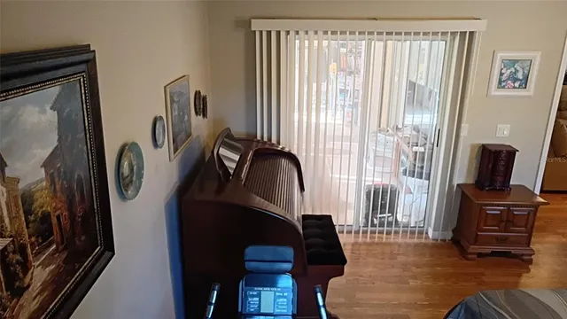 a bedroom with a bed and a mirror