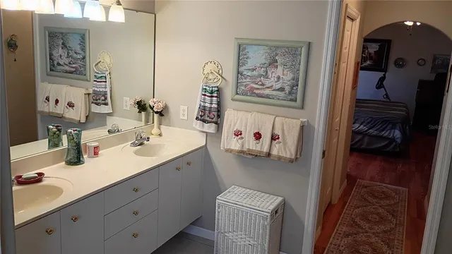 a bedroom with a bed and a cabinets
