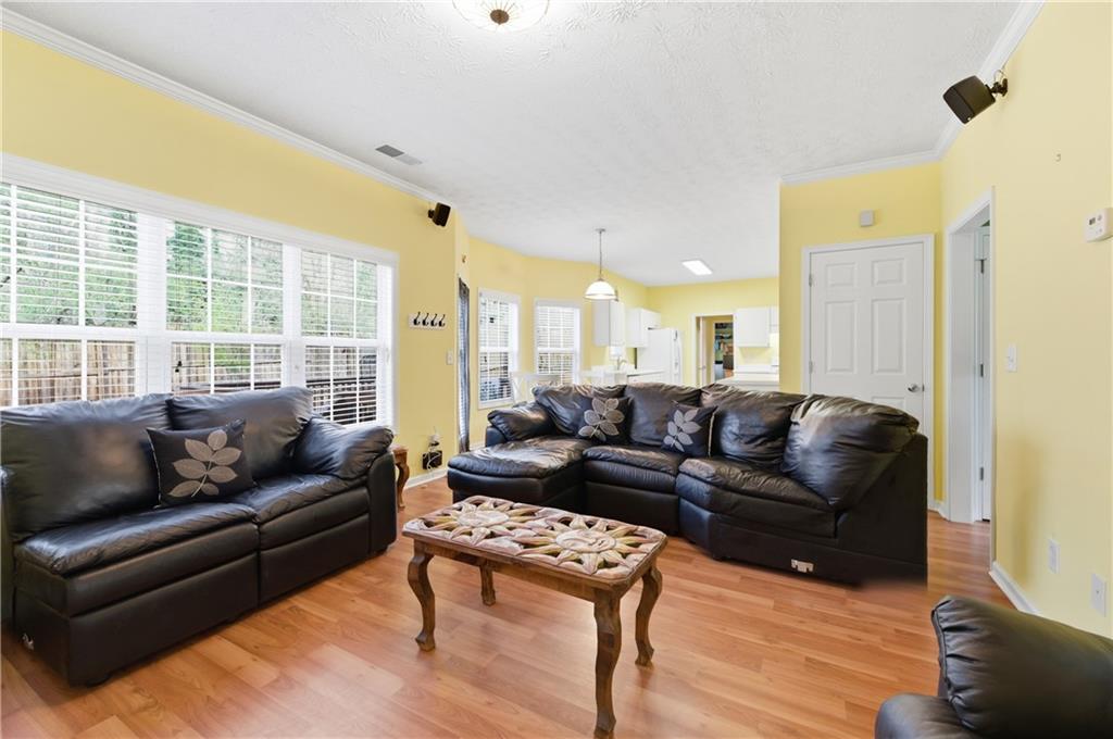 5980 Giles Road Lithonia, GA 30058 - Photo 17 of 38 a living room with furniture and a large window
