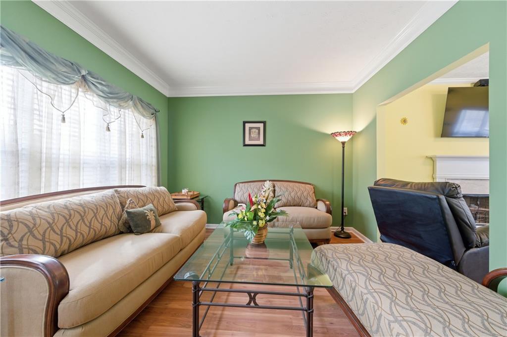 5980 Giles Road Lithonia, GA 30058 - Photo 8 of 38 a living room with furniture and a large window