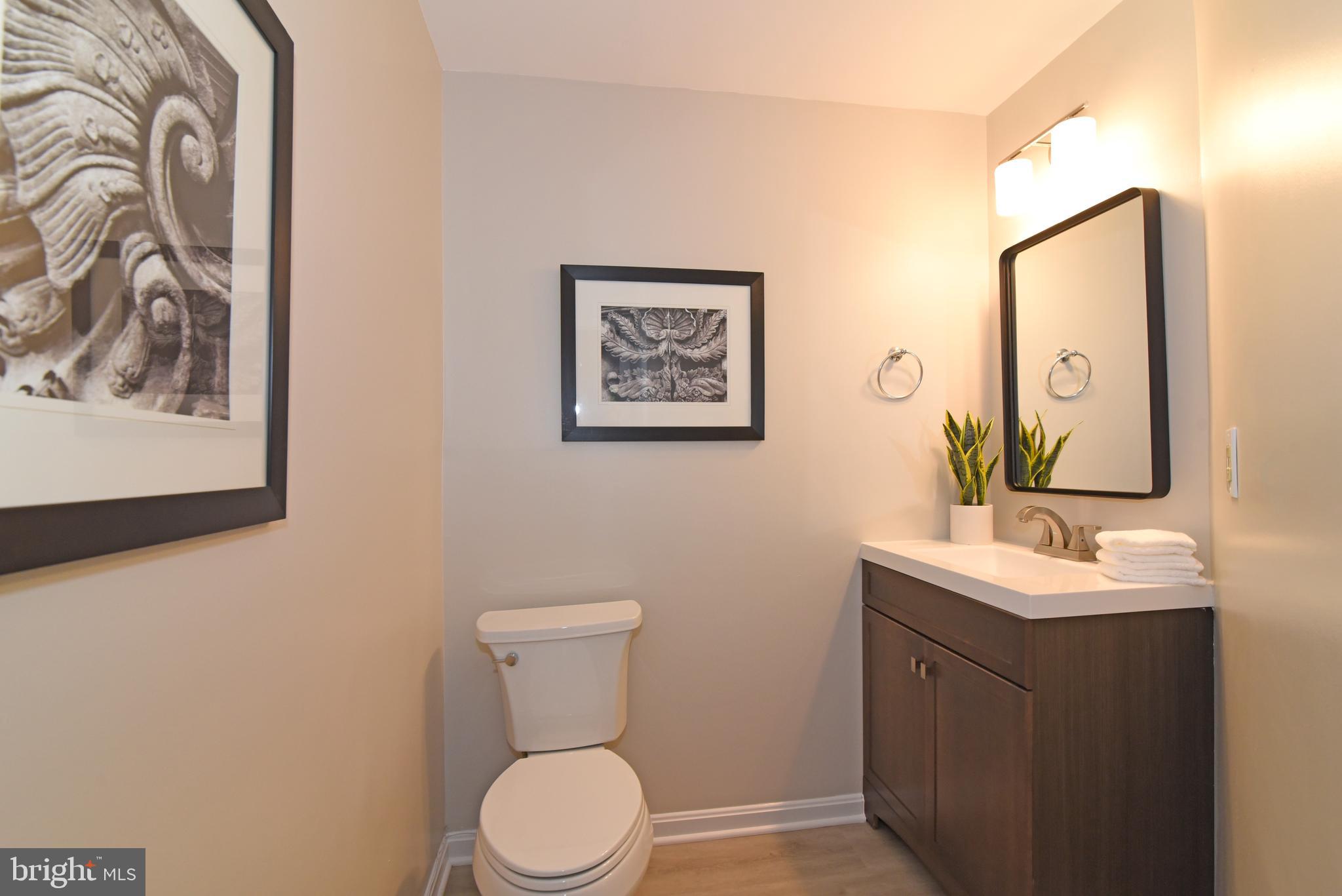11940 Sentinel Point Court Reston, VA 20191 - Photo 39 of 43 The lower level bathroom has also been updated.