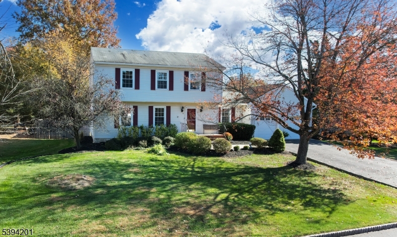 4 Marshall Road Hillsborough, NJ 08844 - Photo 1 of 38 a view of a house with a yard and sitting area