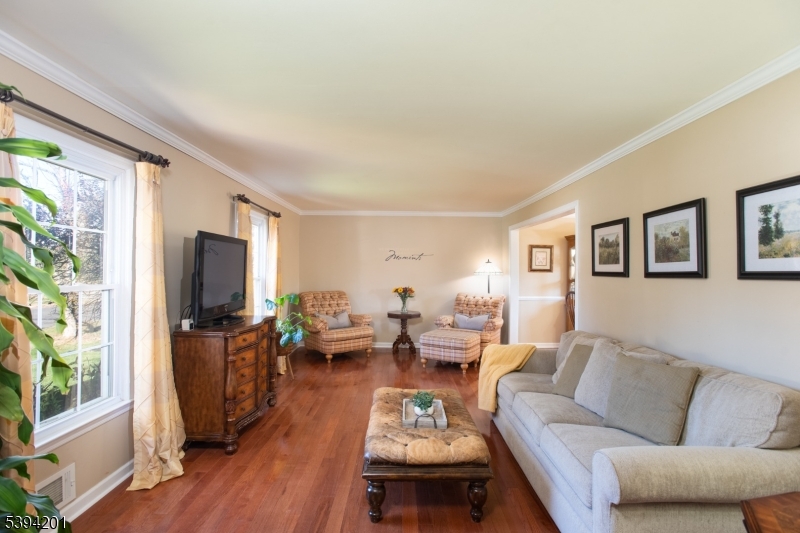 4 Marshall Road Hillsborough, NJ 08844 - Photo 11 of 38 a living room with furniture flat screen tv and large windows