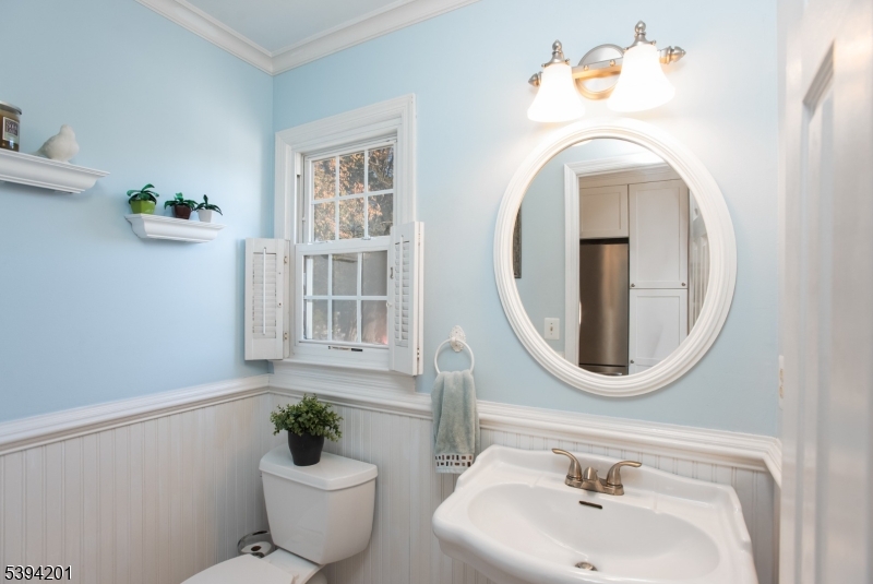 4 Marshall Road Hillsborough, NJ 08844 - Photo 14 of 38 a bathroom with a sink and mirror