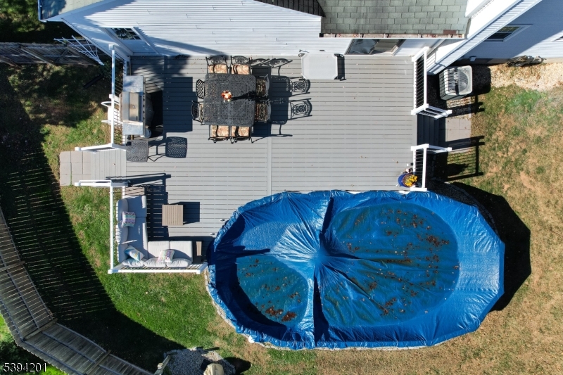 4 Marshall Road Hillsborough, NJ 08844 - Photo 30 of 38 a view of a chairs and tables in the balcony