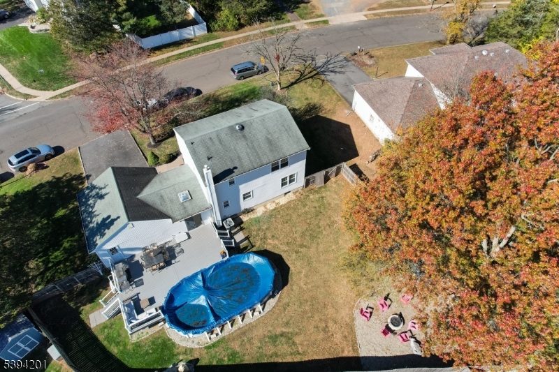 4 Marshall Road Hillsborough, NJ 08844 - Photo 32 of 38 an aerial view of a house with a swimming pool and outdoor seating